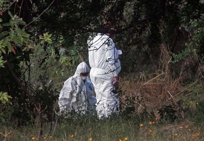 Suman 57 los cuerpos hallados en fosas de Jalisco